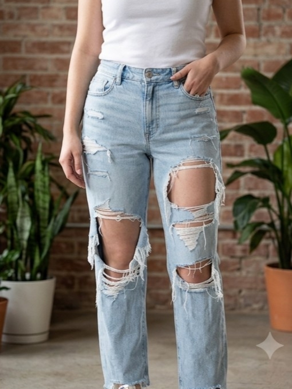 American Eagle Outfitters Light Blue High-Rise Distressed Jeans